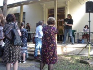 Russell B Farr at the launch of Juliet Mariliier's "Prickle Moon" saying thank you to NSW Writers' Centre Rose Powell, being photographed by Cat Sparks, being photographed by me!